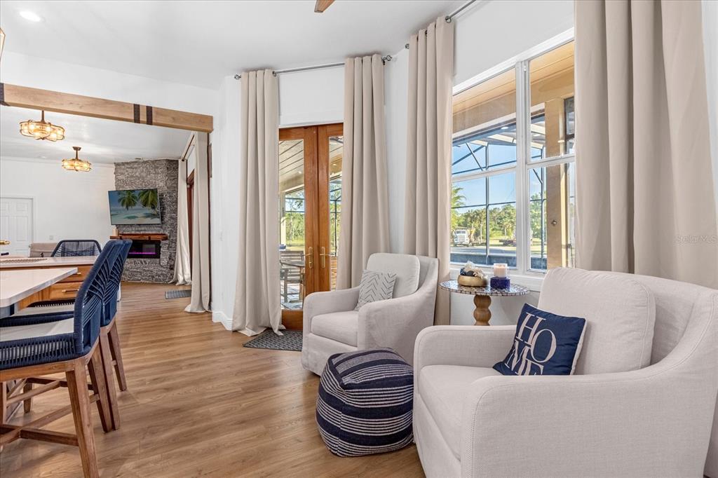 2975 West Osceola Road Geneva, FL 32732 - Photo 20 of 45 a living room with furniture and a large window