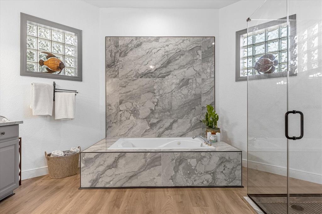 2975 West Osceola Road Geneva, FL 32732 - Photo 27 of 45 a living room with a couch and painting on the wall