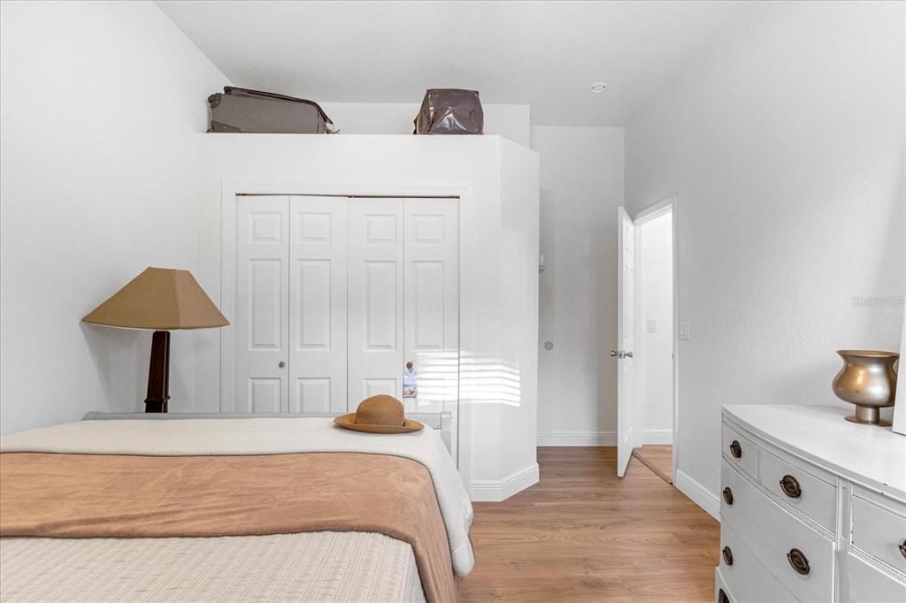 2975 West Osceola Road Geneva, FL 32732 - Photo 34 of 45 a bedroom with a bed and a cabinets