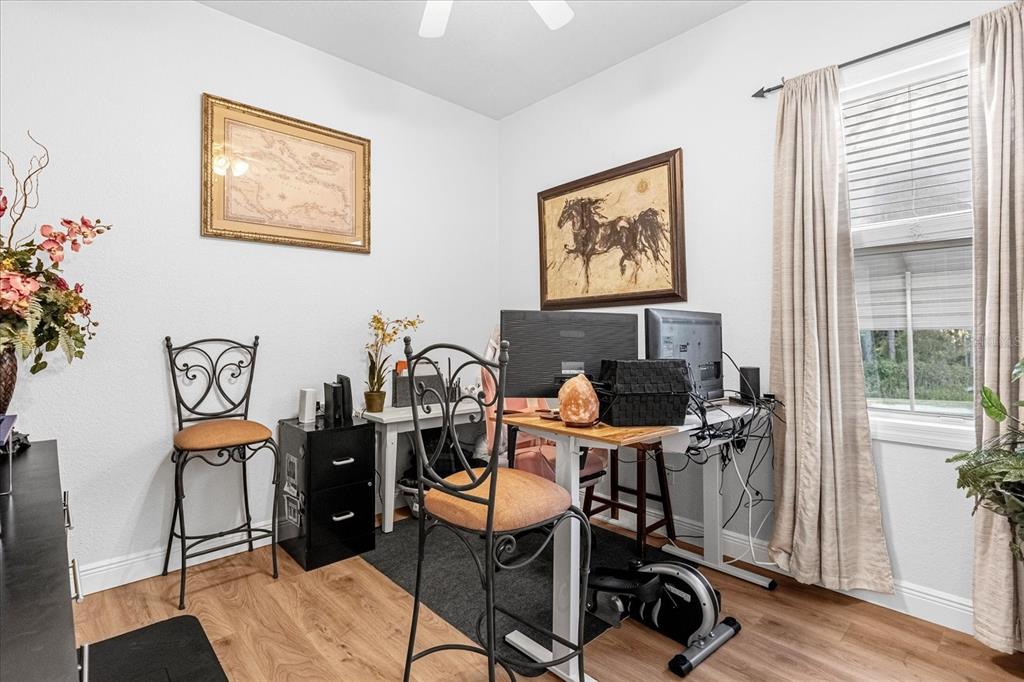 2975 West Osceola Road Geneva, FL 32732 - Photo 36 of 45 a view of a workspace with furniture and a window