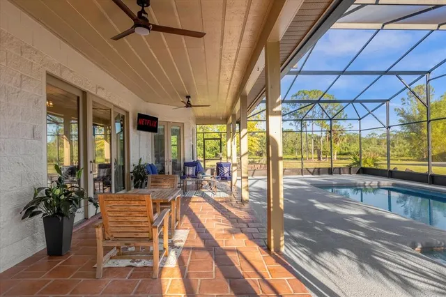 a view of yard with patio