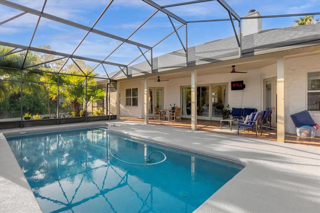 2975 West Osceola Road Geneva, FL 32732 - Photo 39 of 45 a view of a swimming pool with a patio