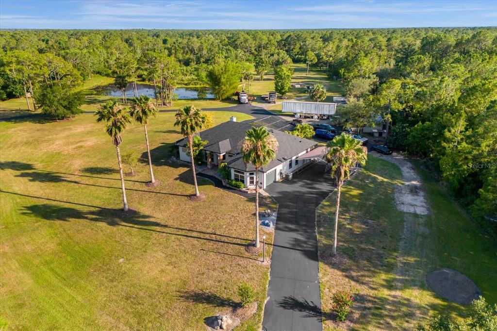 2975 West Osceola Road Geneva, FL 32732 - Photo 5 of 45 a view of a lake from a building