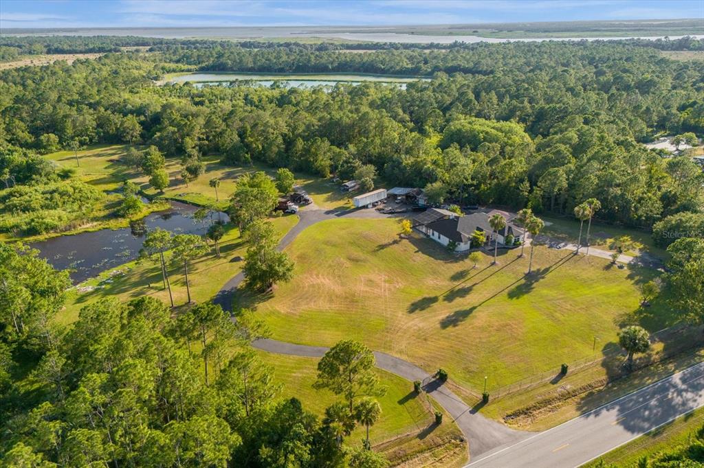 2975 West Osceola Road Geneva, FL 32732 - Photo 9 of 45 a view of a lake with a mountain view