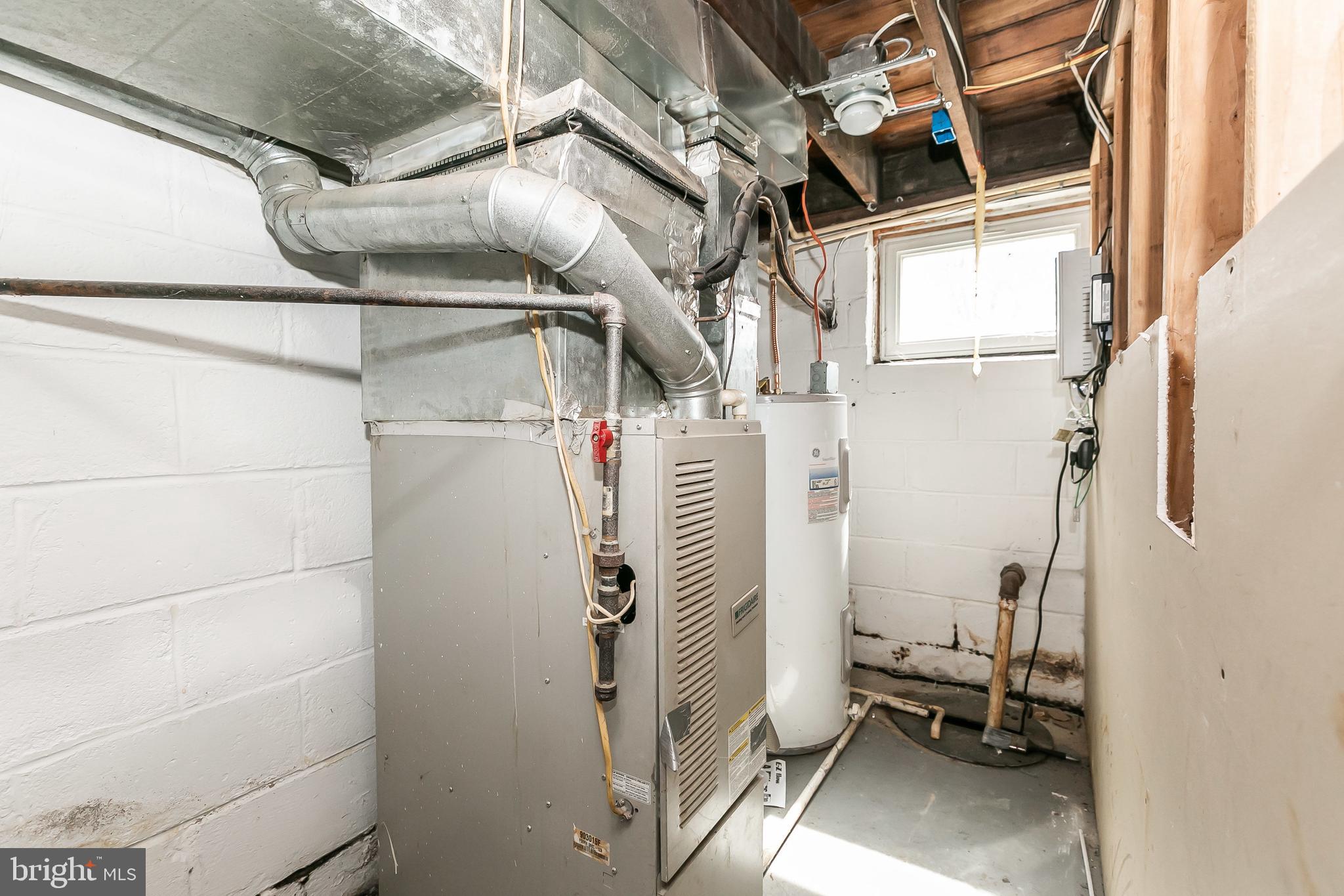 7467 Berkshire Road Baltimore, MD 21222 - Photo 23 of 26 Gas furnace, sump pump