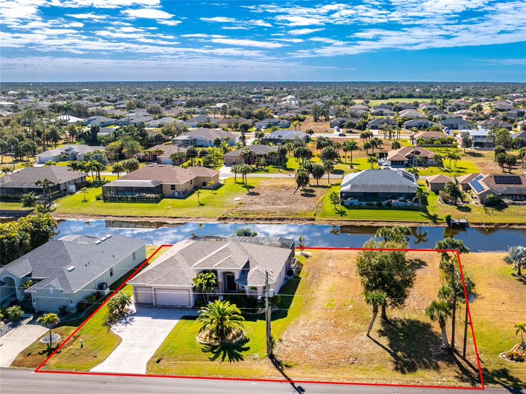 199 Marker Road Rotonda West, FL 33947 - Photo 2 of 55 an aerial view of residential houses with outdoor space
