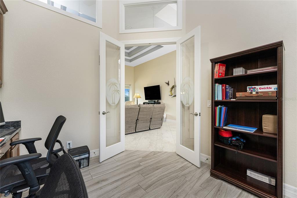 199 Marker Road Rotonda West, FL 33947 - Photo 35 of 55 a view of a workspace with furniture and wooden floor