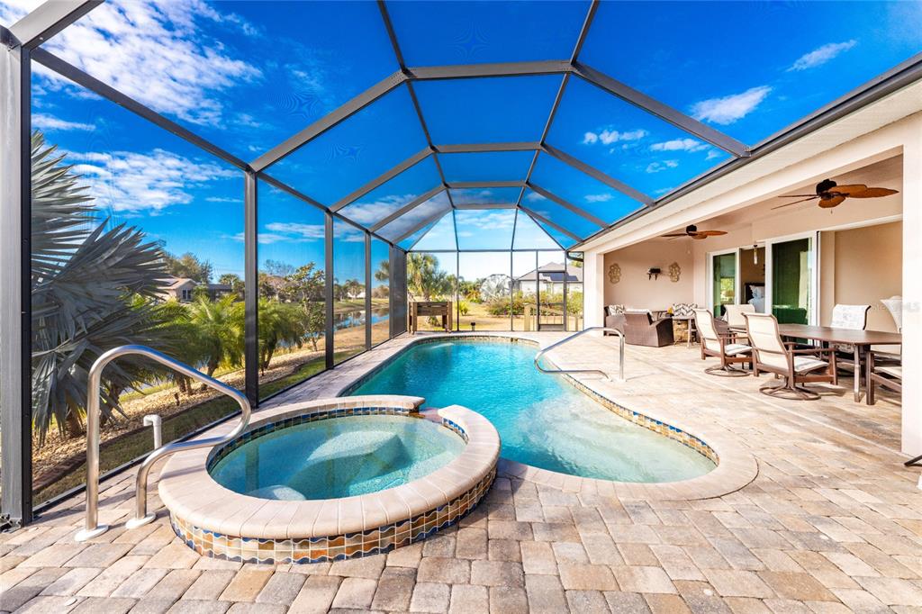 199 Marker Road Rotonda West, FL 33947 - Photo 45 of 55 a view of a swimming pool with chairs