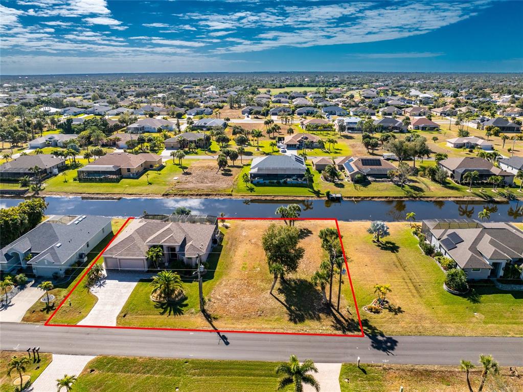 199 Marker Road Rotonda West, FL 33947 - Photo 48 of 55 an aerial view of residential houses with outdoor space