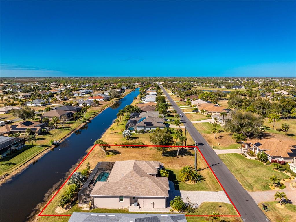 199 Marker Road Rotonda West, FL 33947 - Photo 52 of 55 an aerial view of residential houses with outdoor space