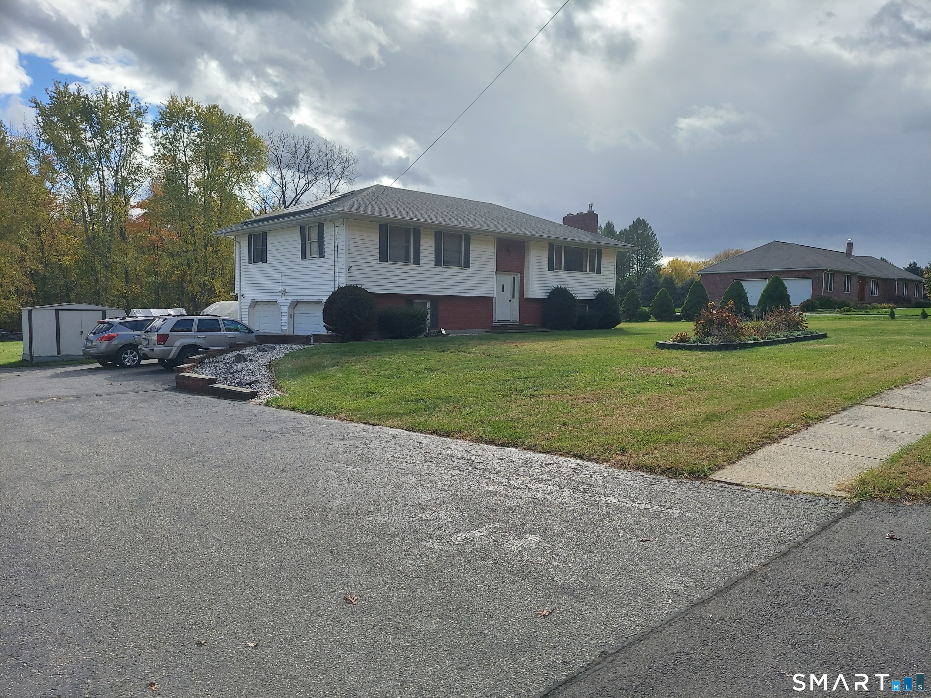 95 Abbe Road Enfield, CT 06082 - Photo 2 of 2 a view of a house with a patio