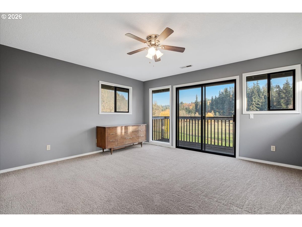 13492 South Warnock Road Oregon City, OR 97045 - Photo 17 of 48 a view of an empty room with a window