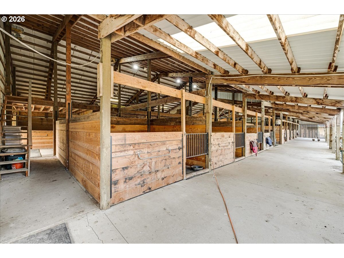 13492 South Warnock Road Oregon City, OR 97045 - Photo 23 of 48 a view of a garage with wooden wall