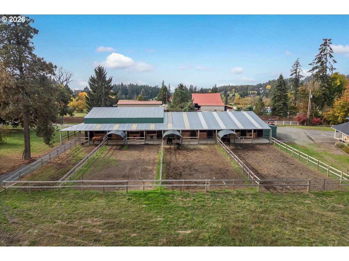 13492 South Warnock Road Oregon City, OR 97045 - Photo 24 of 48 a backyard of a house with table and chairs