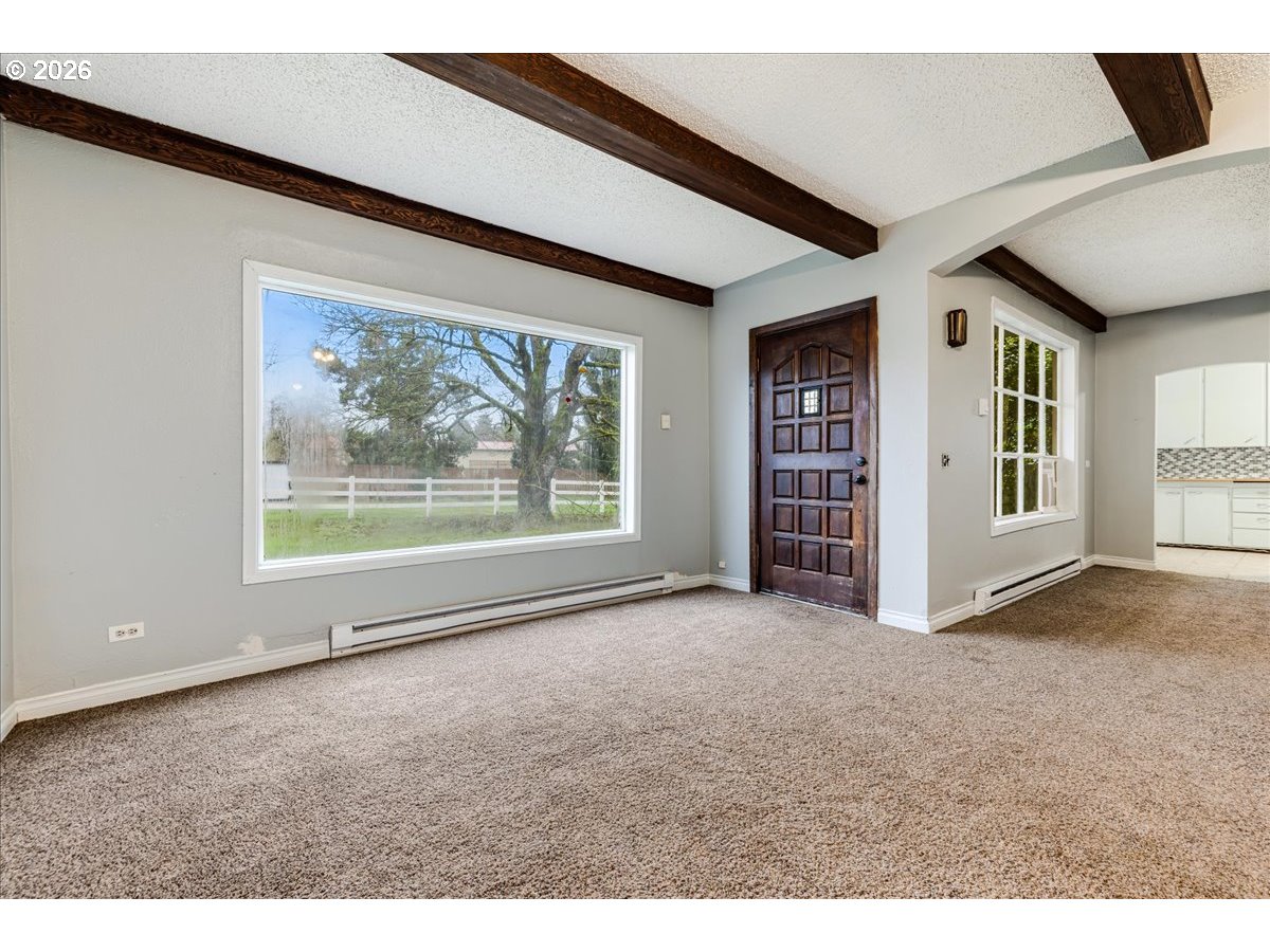 13492 South Warnock Road Oregon City, OR 97045 - Photo 28 of 48 a view of empty room with window and air conditioner