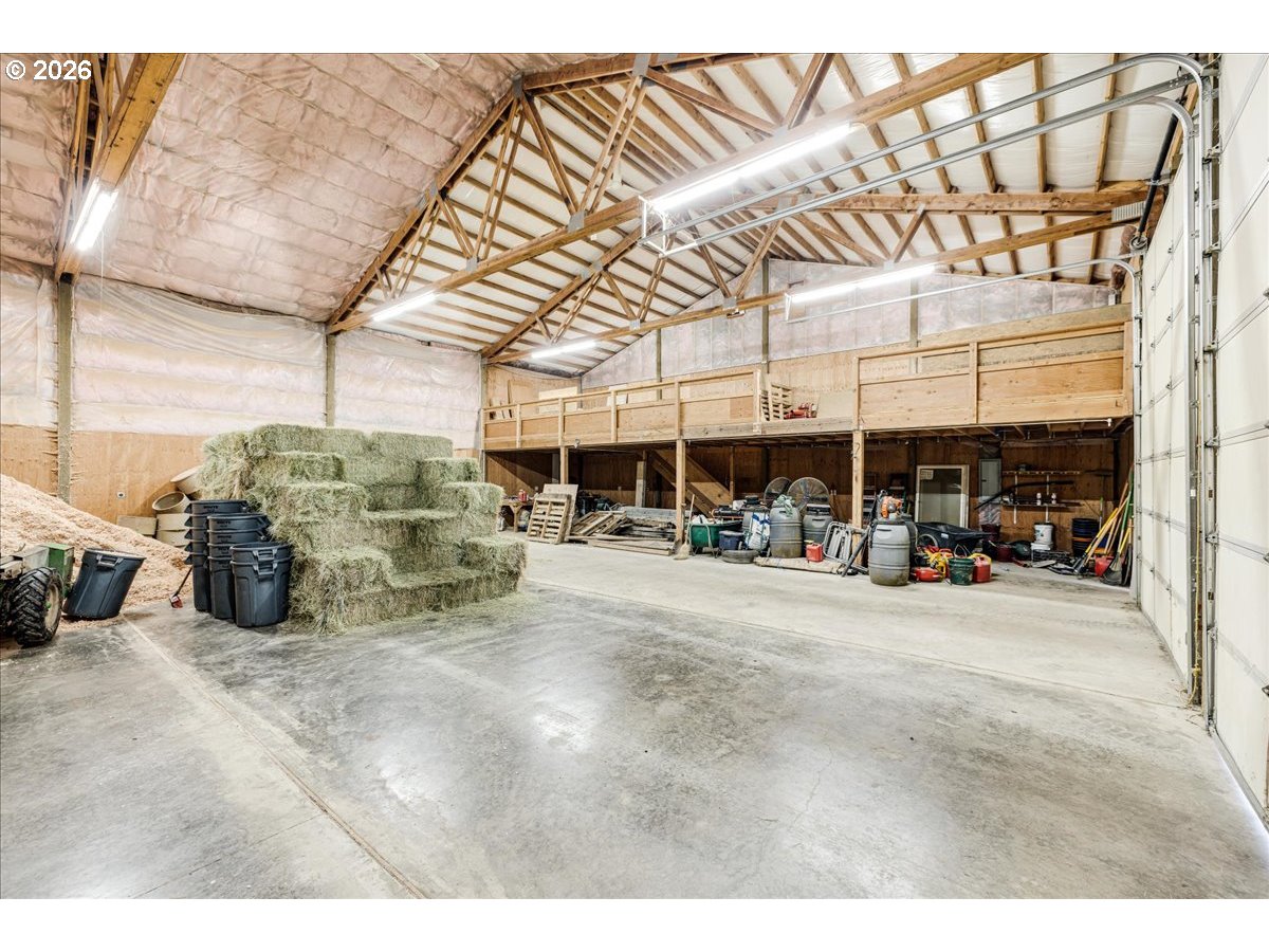 13492 South Warnock Road Oregon City, OR 97045 - Photo 46 of 48 a view of a garage with furniture