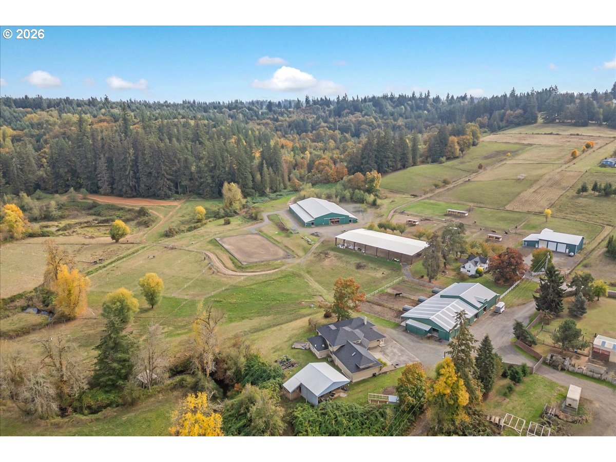 13492 South Warnock Road Oregon City, OR 97045 - Photo 47 of 48 a view of a lake with a yard
