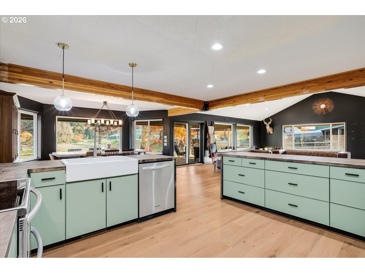 13492 South Warnock Road Oregon City, OR 97045 - Photo 5 of 48 a kitchen with sink and cabinets