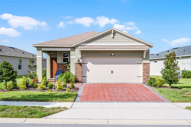 a front view of house with yard