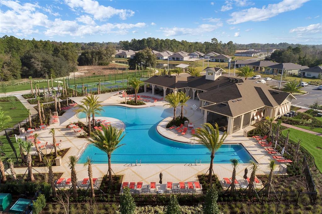 3435 Yellowtop Loop Clermont, FL 34714 - Photo 26 of 42 a view of a lake with couches and city view