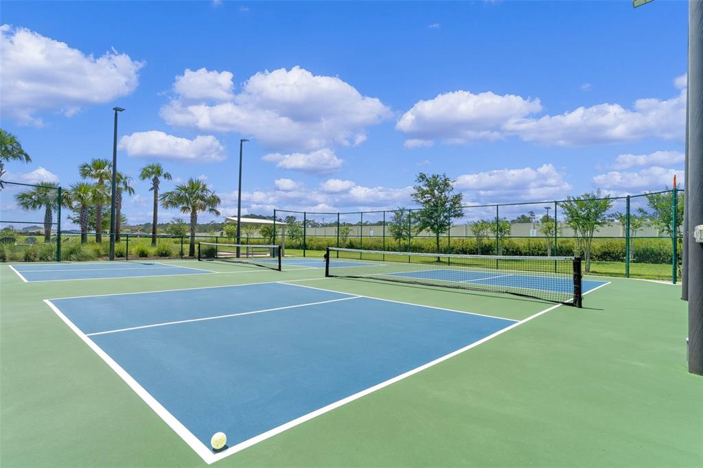 3435 Yellowtop Loop Clermont, FL 34714 - Photo 30 of 42 a view of a tennis court
