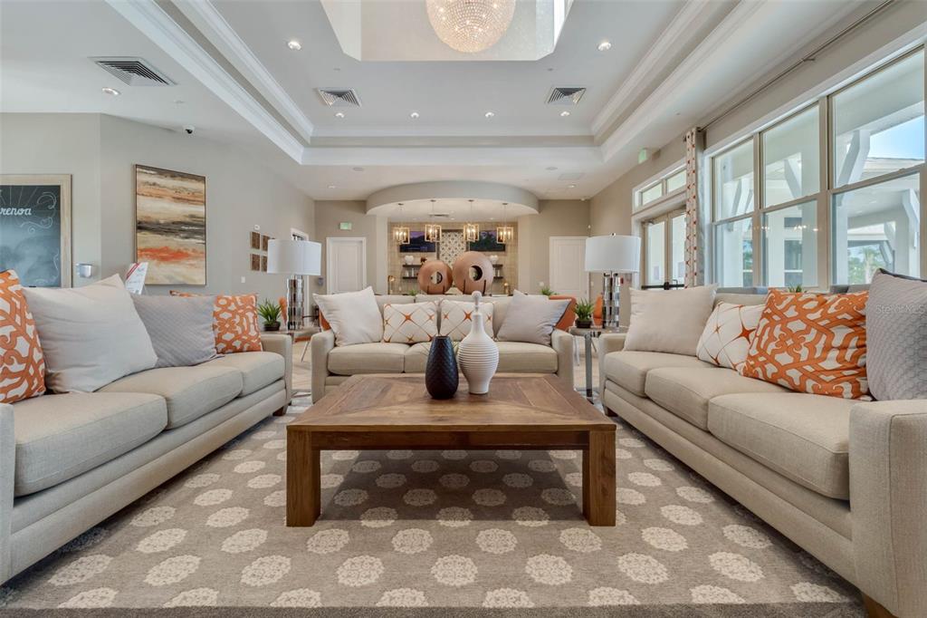 3435 Yellowtop Loop Clermont, FL 34714 - Photo 36 of 42 a living room with furniture and a large window