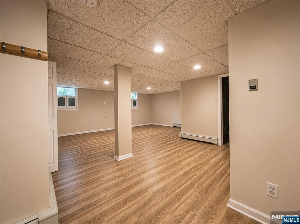 84 Valley View Avenue Ridgewood, NJ 07450 - Photo 15 of 20 a view of a hallway with wooden floor
