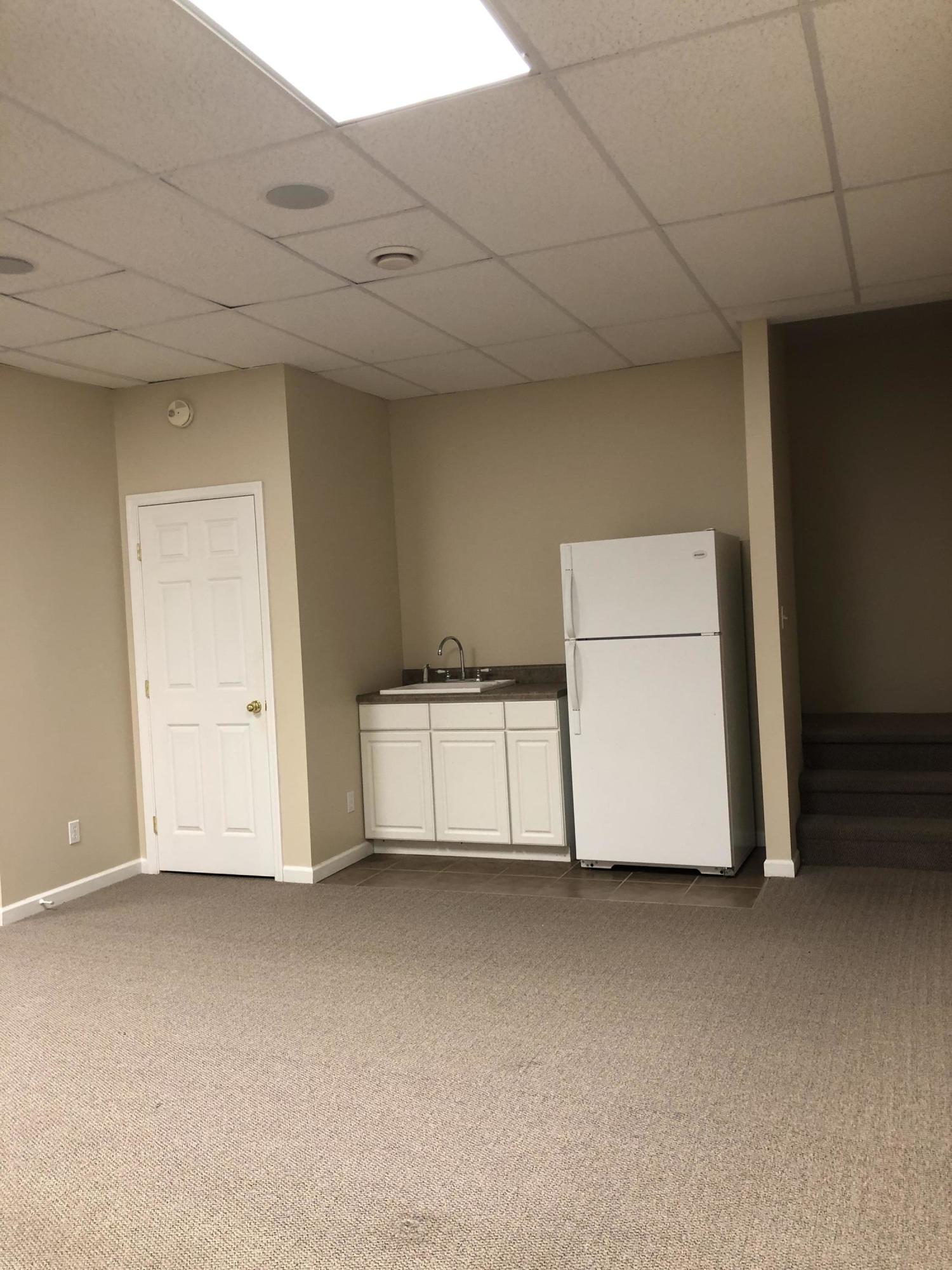 104 Weldon Lane Oak Ridge, TN 37830 - Photo 21 of 30 Fridge and Sink in Rec Room