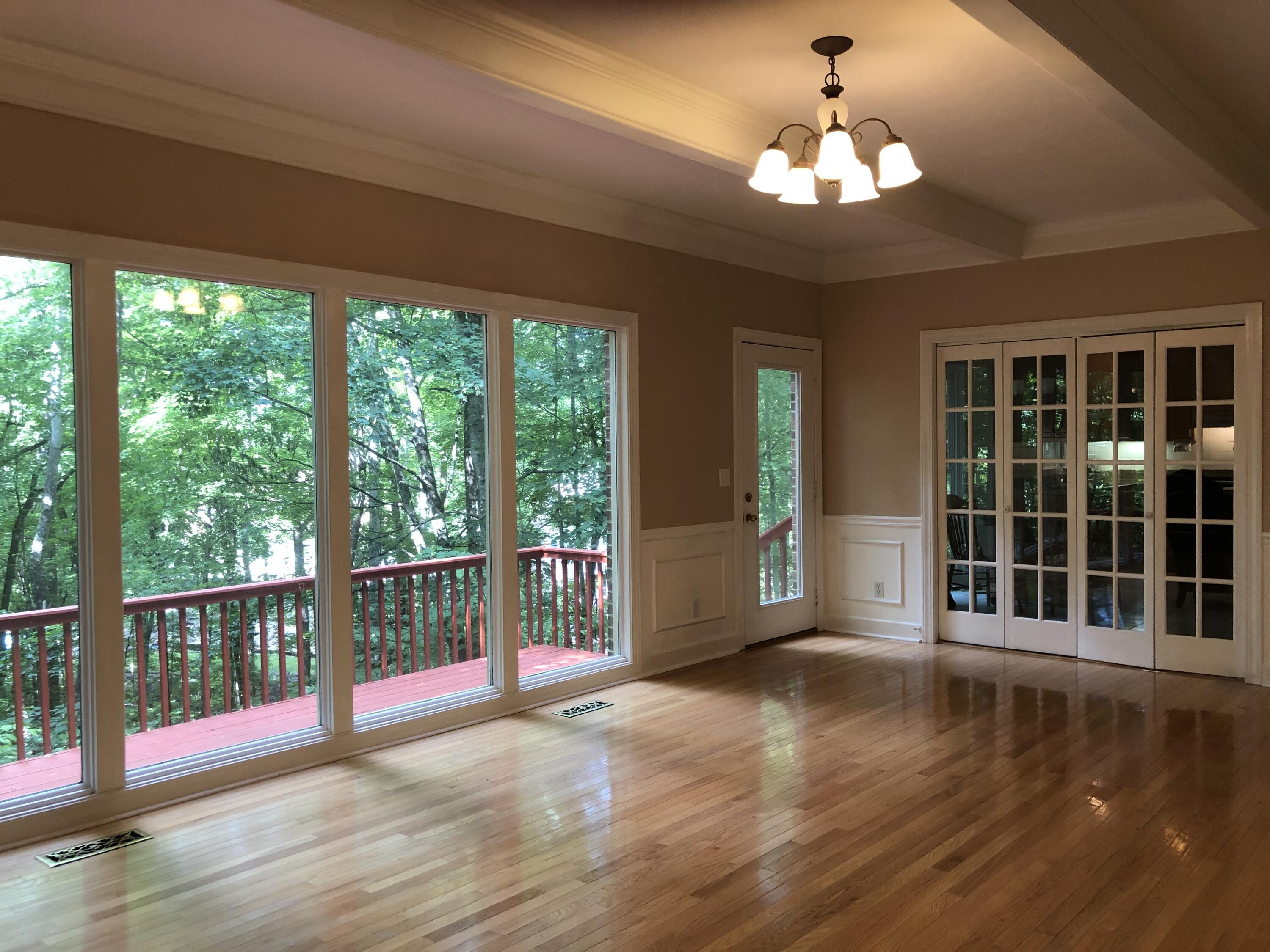 Beamed Ceilings and Large Windows