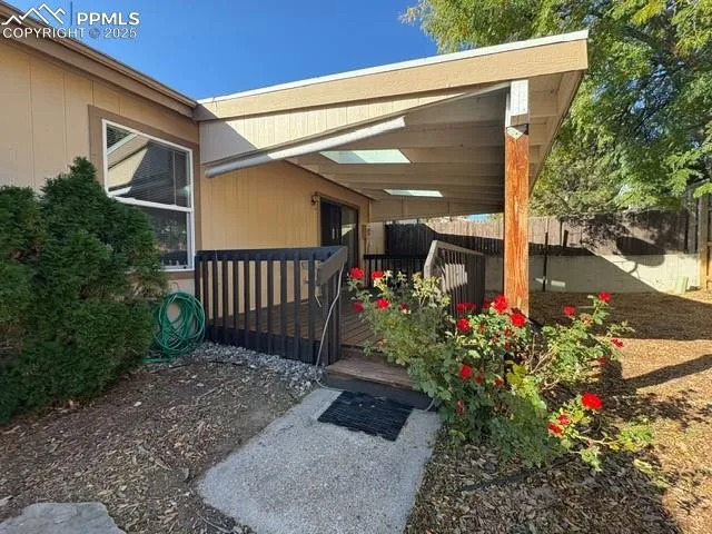 a flower plants in front of a house