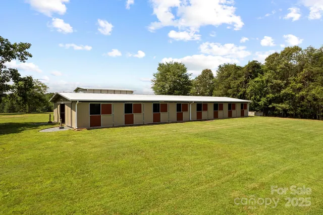 a view of a lake with houses in the background