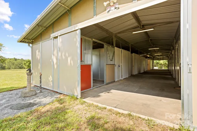 a view of a swimming pool with a yard