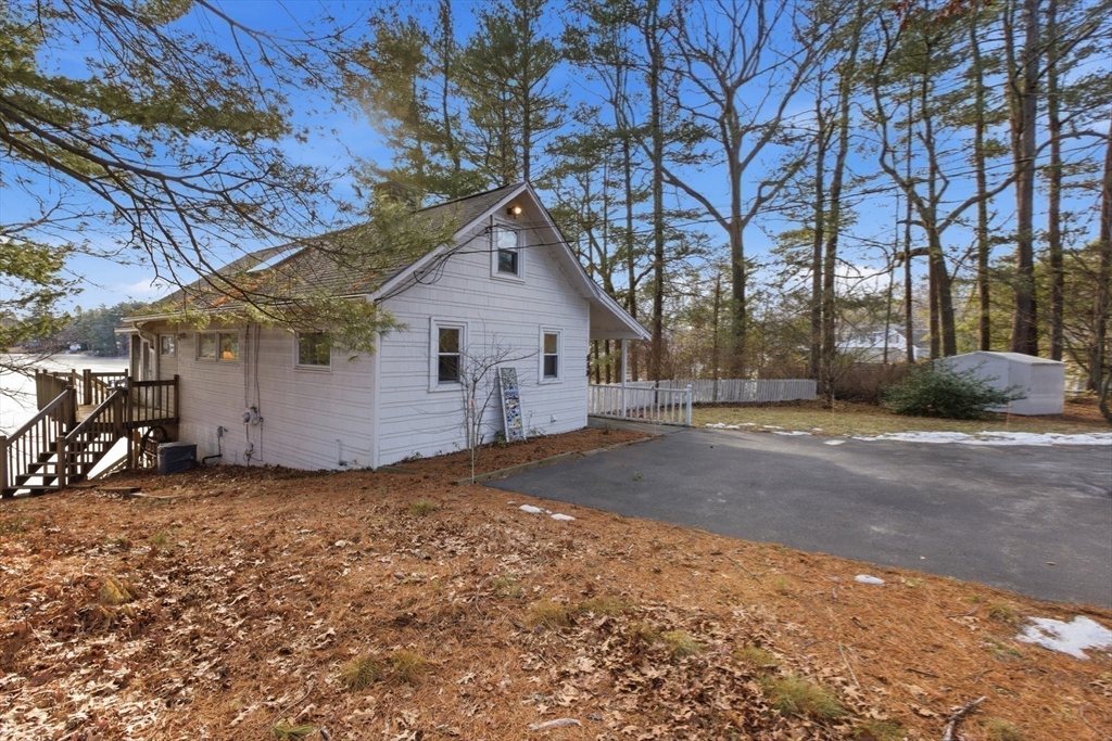113 Hunter Avenue Hudson, MA 01749 - Photo 10 of 16 a view of a house with a yard
