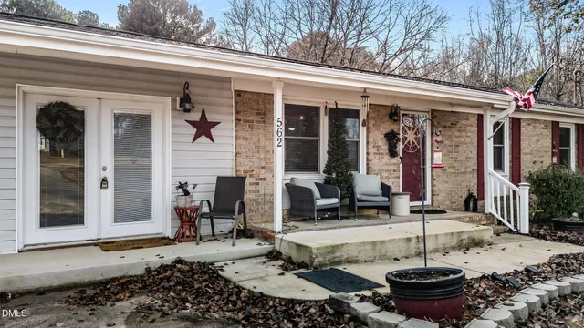 a front view of a house with patio