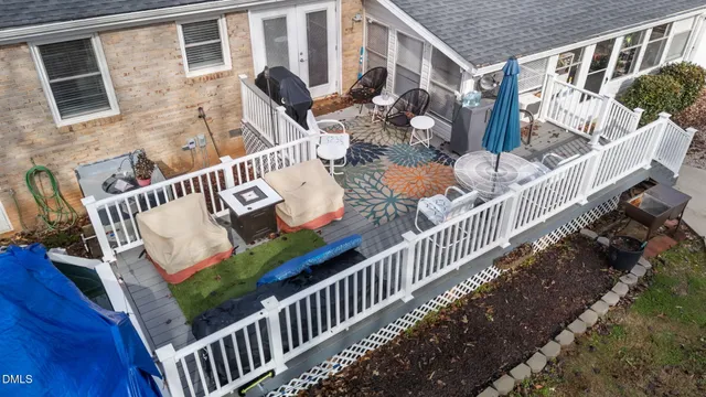 a view of balcony with wooden floor
