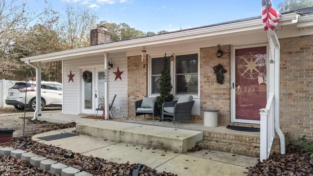 a front view of a house with patio