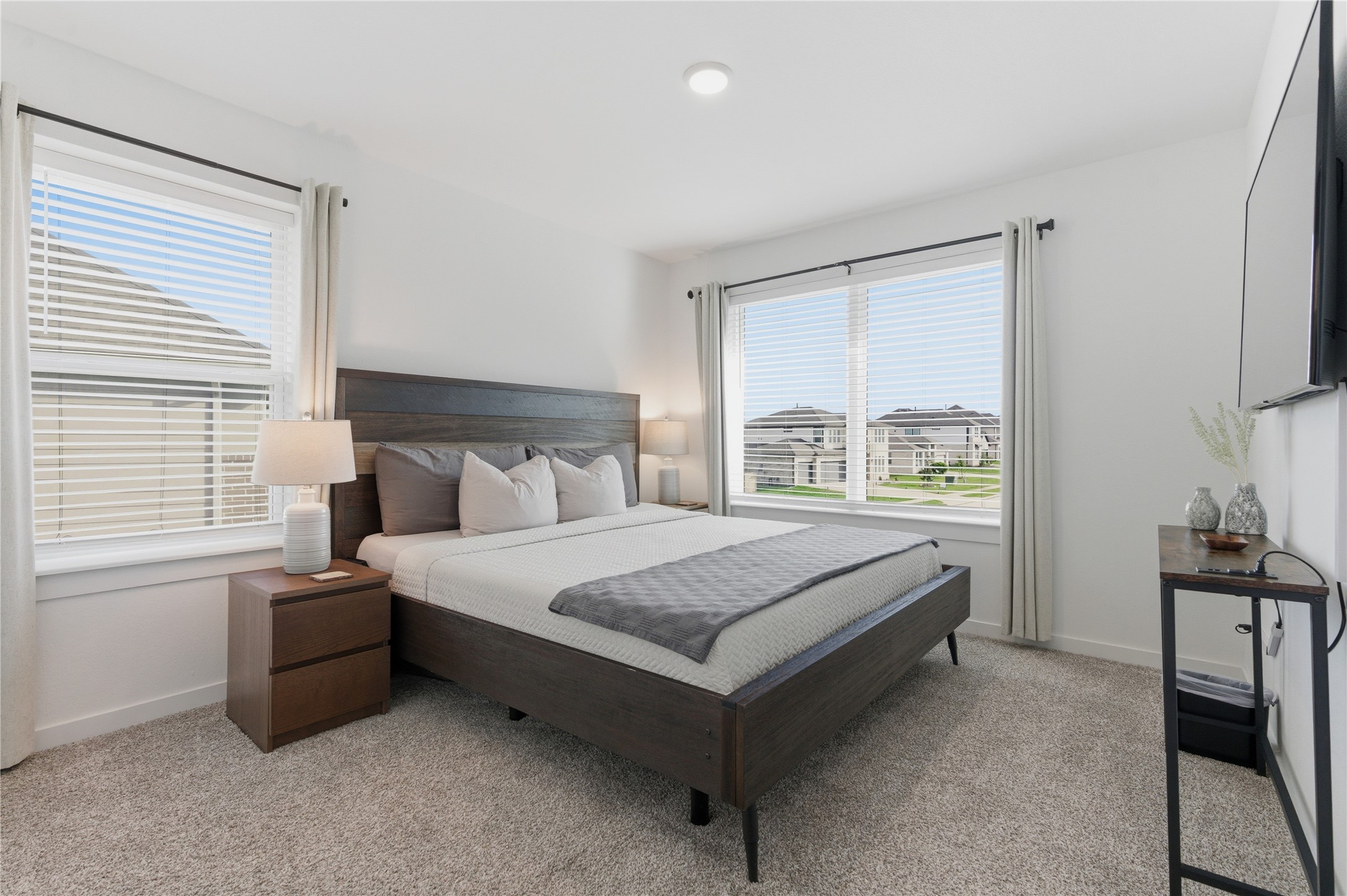14108 Redfish Lake Conroe, TX 77384 - Photo 23 of 37 a bed sitting in a bedroom next to a window