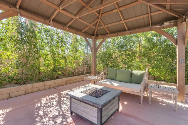 a outdoor living space with furniture and garden view