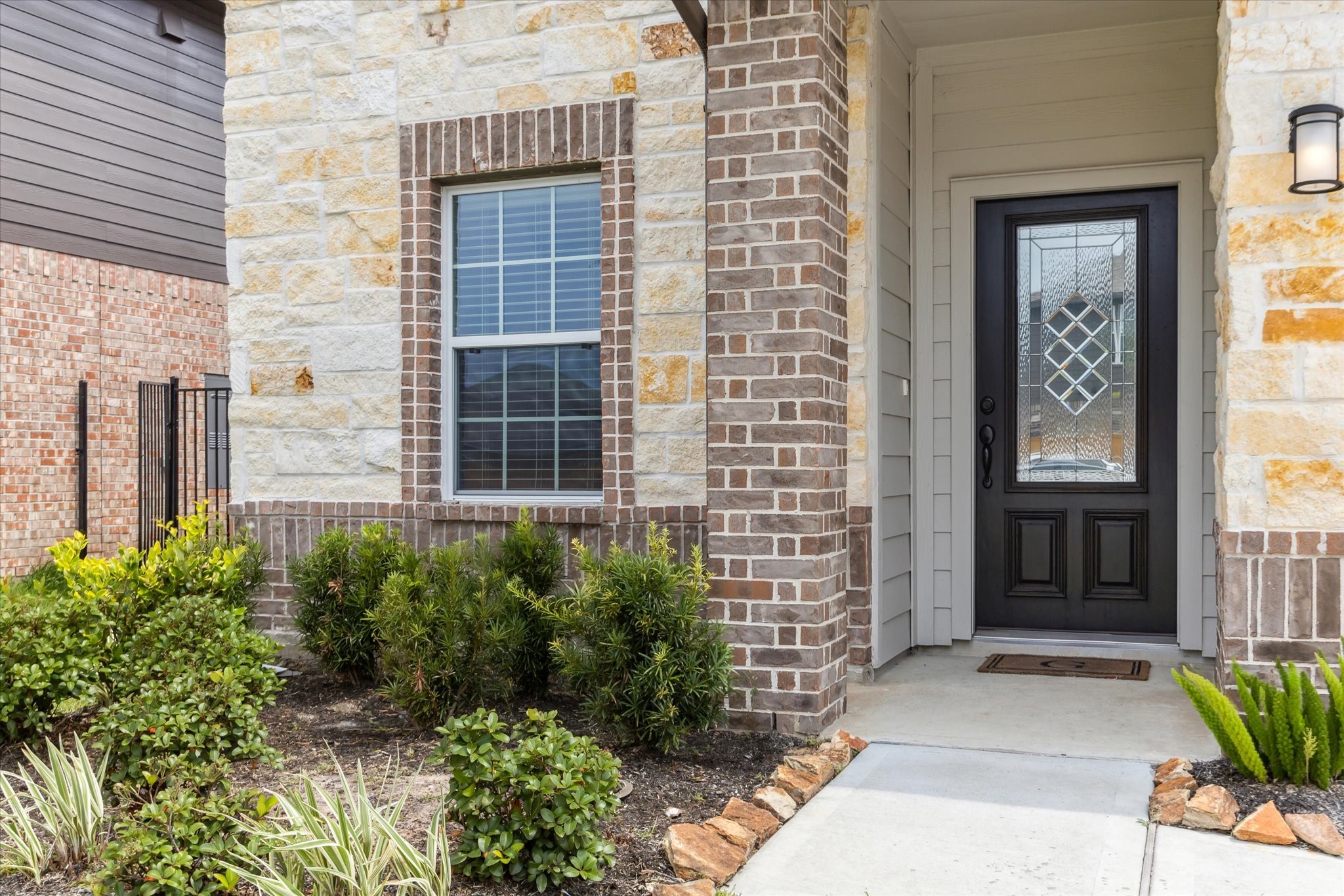 1523 Alpine Drive Rosharon, TX 77583 - Photo 3 of 25 a front view of a house with a plants