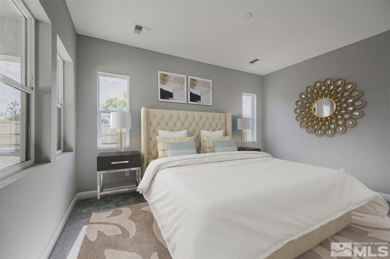 12237 Pewter Point Street, Unit HOMESITE 42 Reno, NV 89521 - Photo 8 of 10 a bedroom with a bed and a window