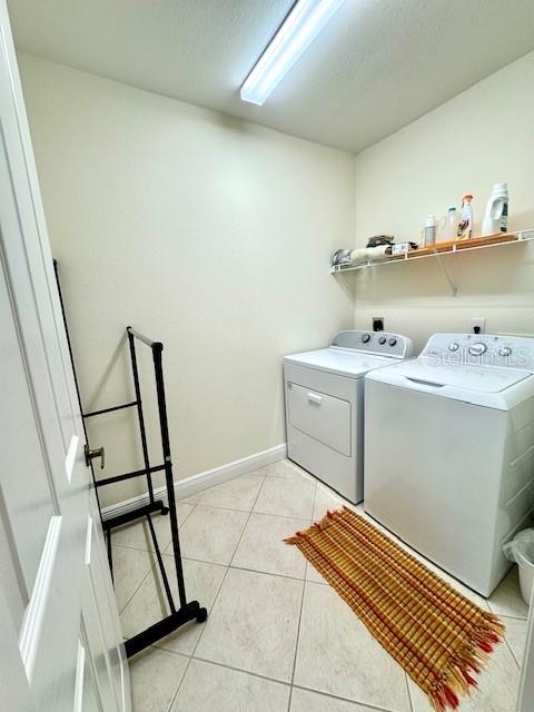 24417 Baltic Avenue, Unit 1102 Punta Gorda, FL 33955 - Photo 28 of 53 a room with storage and utility