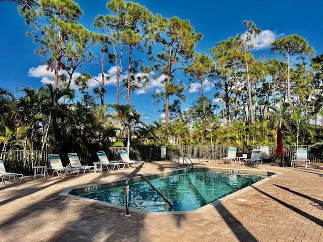24417 Baltic Avenue, Unit 1102 Punta Gorda, FL 33955 - Photo 7 of 53 a view of a yard with plants