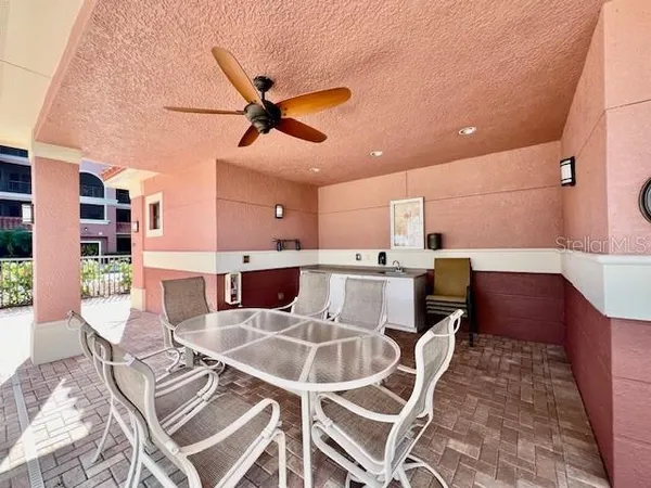 a room with gym equipment and a large window