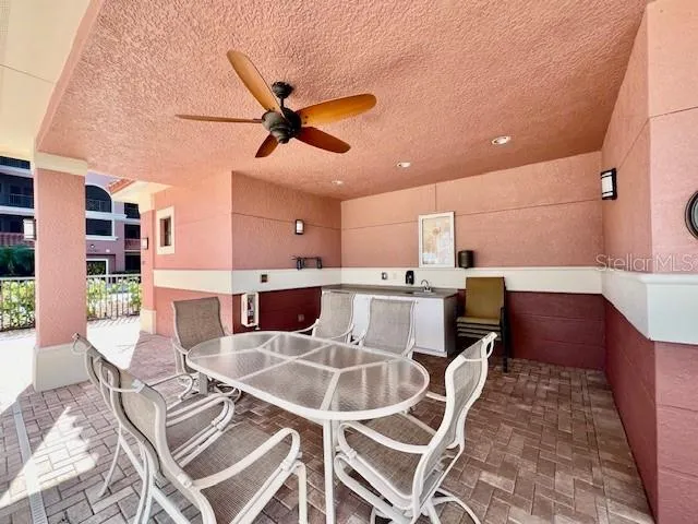 a room with gym equipment and a large window