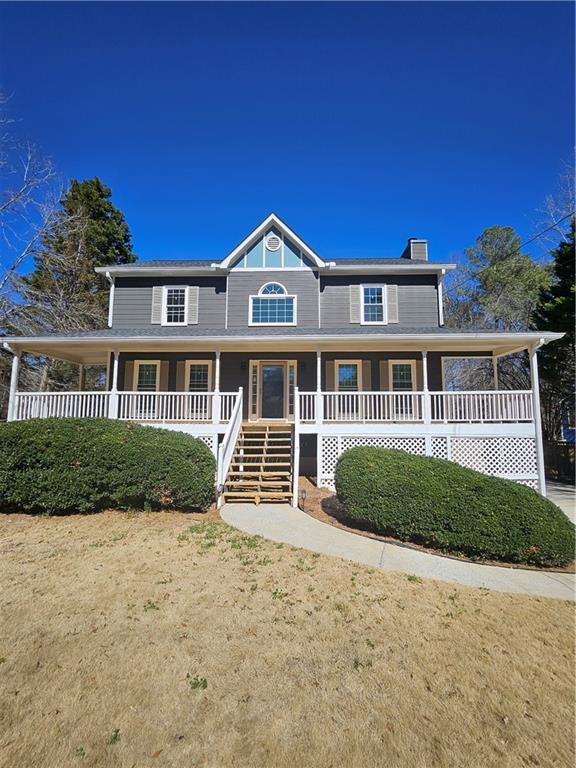 291 Sterling Trail Powder Springs, GA 30127 - Photo 1 of 43 a front view of a house with a yard