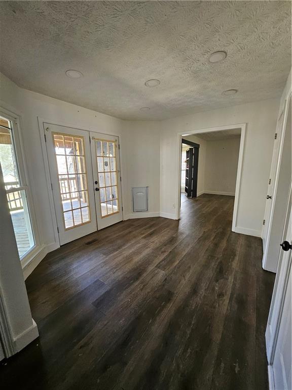 291 Sterling Trail Powder Springs, GA 30127 - Photo 12 of 43 wooden floor in an empty room with a window