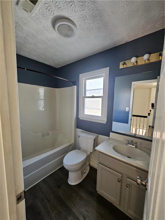 291 Sterling Trail Powder Springs, GA 30127 - Photo 23 of 43 a bathroom with a sink toilet a mirror and shower