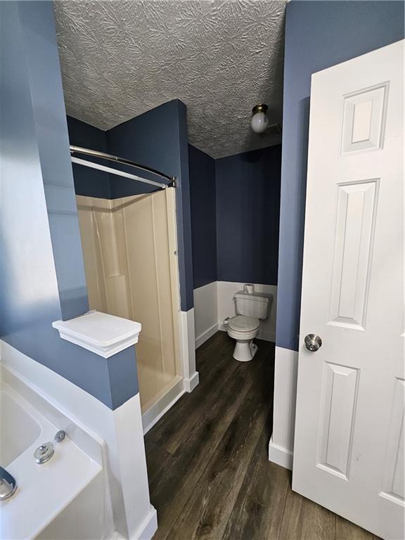 291 Sterling Trail Powder Springs, GA 30127 - Photo 26 of 43 a bathroom with a sink a toilet and shower