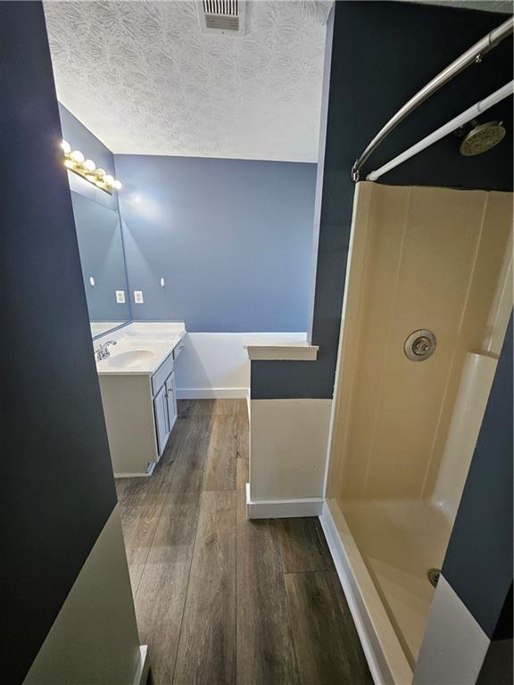 291 Sterling Trail Powder Springs, GA 30127 - Photo 27 of 43 a bathroom with a sink a toilet and shower
