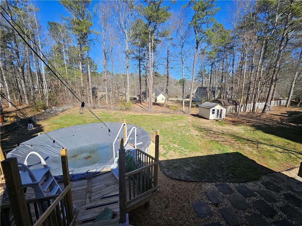 291 Sterling Trail Powder Springs, GA 30127 - Photo 43 of 43 a view of a swimming pool with sitting area
